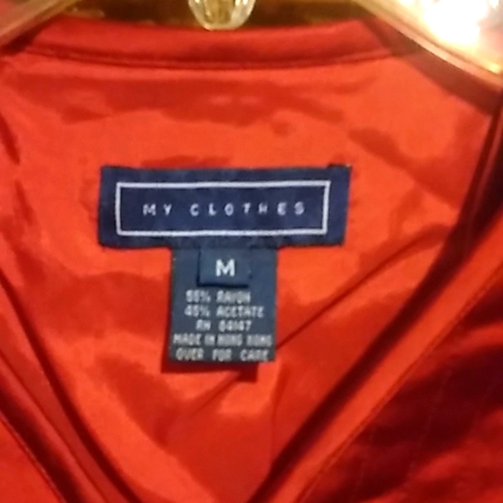 A fitted front zipped jacket worn once no flaws